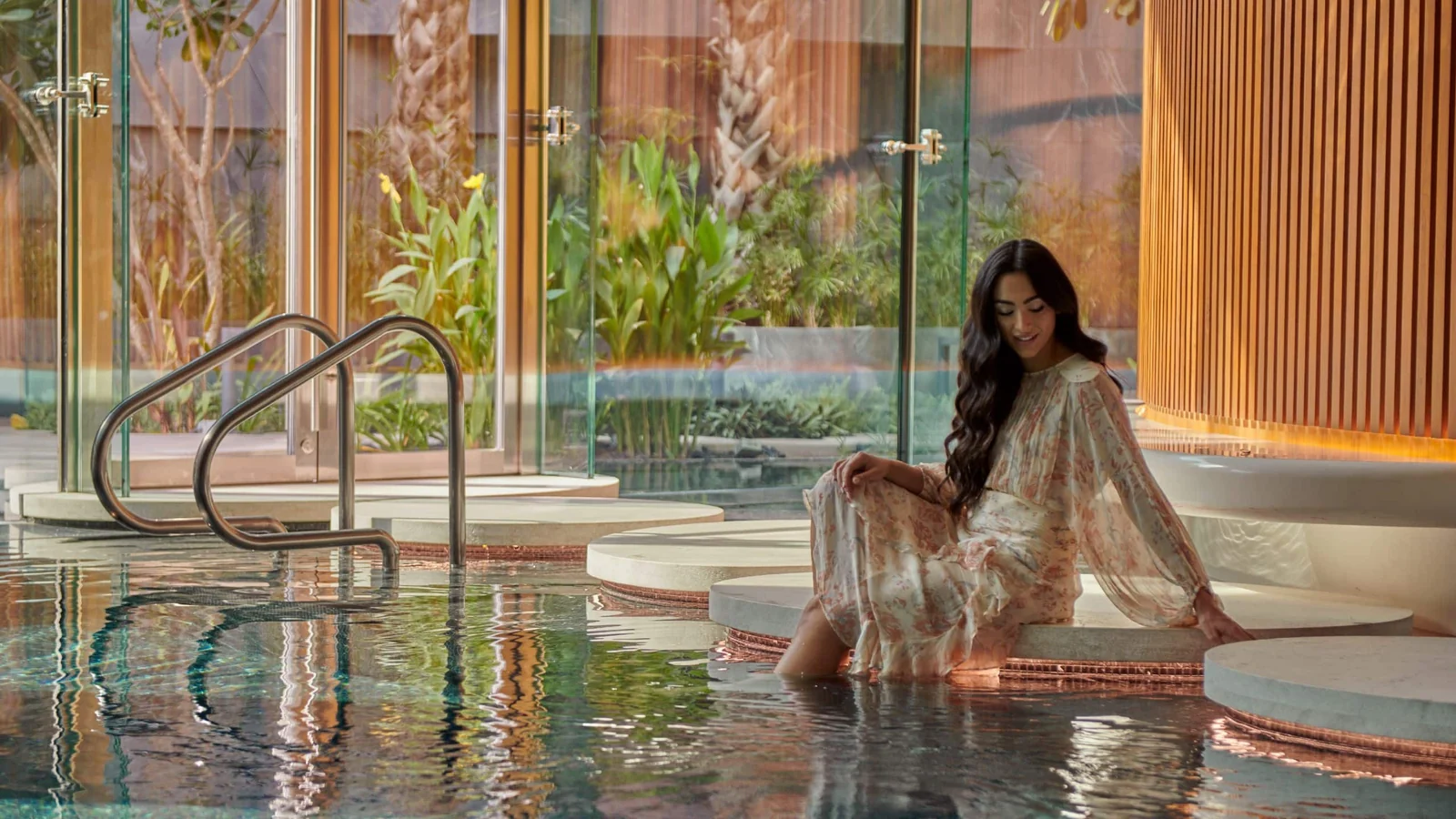 Poolside relaxation in Grand Hyatt Kuwait’s official photography.