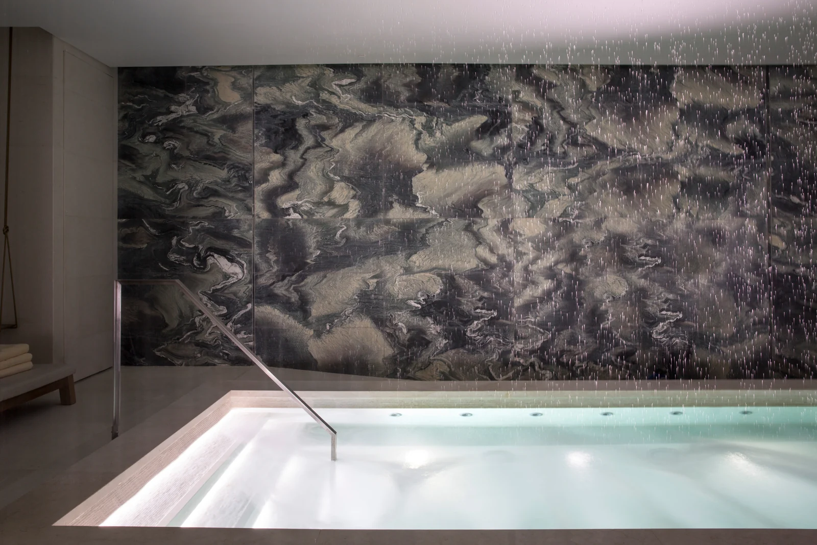 The indoor whirlpool and marble surround.